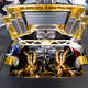 Non-standard headers and exhaust allow a better view of the BMW V12. Rear brake ducts on left and right.